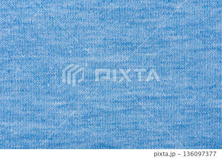 Blue background knitted fabric macro photo, clothing. Blue background knitted fabric macro photo, clothing. 136097377