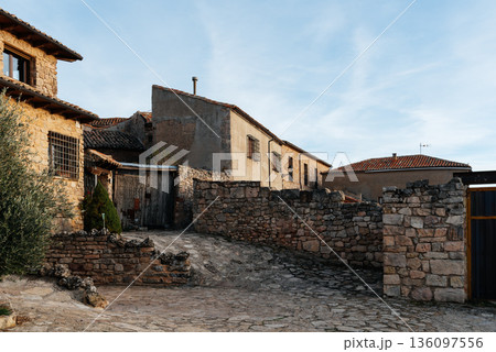 Medinaceli medieval village street with traditional stone house Medinaceli medieval village street with traditional stone house 136097556