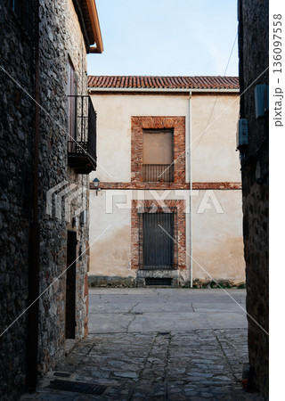 Medinaceli medieval village street with traditional stone house 136097558