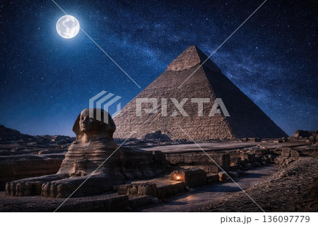 Great Pyramid and Sphinx Under Starry Night Sky with Full Moon in Egypt 136097779