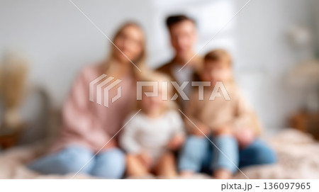 Blurred Family Sitting Together on Sofa at Home Blurred Family Sitting Together on Sofa at Home 136097965