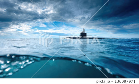 Military Submarine Sailing on Ocean Surface Under Dramatic Cloudy Sky 136097971