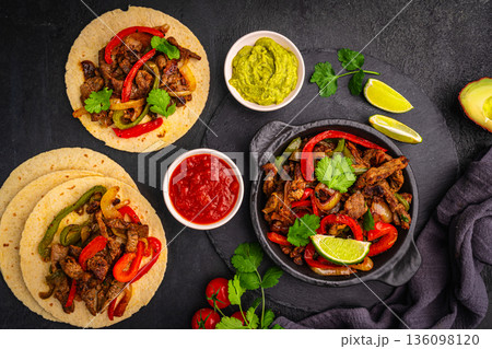Fajitas, beef meat slices 136098120