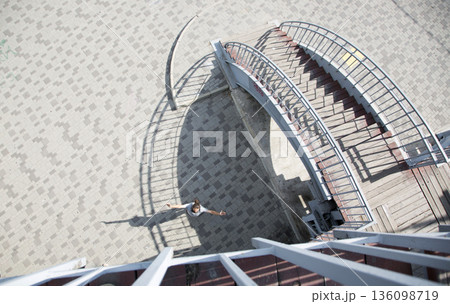 A view of the stairs leading up to the pedestrian bridge 136098719