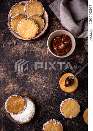 Alfajores, traditional Spanish sandwich cookies Alfajores, traditional Spanish sandwich cookies 136098867