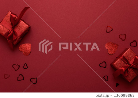 Red Glitter Gift Boxes and Hearts on Festive Background for Valentines Day Celebration Red Glitter Gift Boxes and Hearts on Festive Background for Valentines Day Celebration 136099865