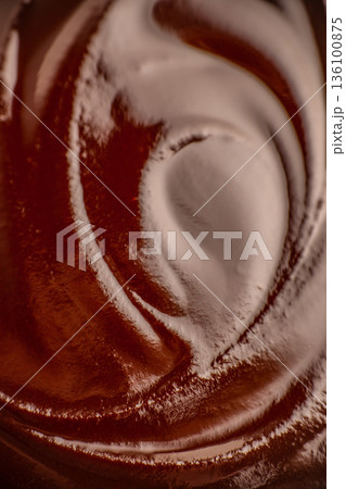 Chocolate cream swirl texture background 136100875
