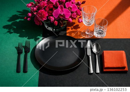 Colorful Dining Scene Arrangement. Striking Contrasting Colors On Contemporary Table Backdrop. Bright And Bold Colors Highlight Stylish Flatware And Artistic Tabletop Display 136102253