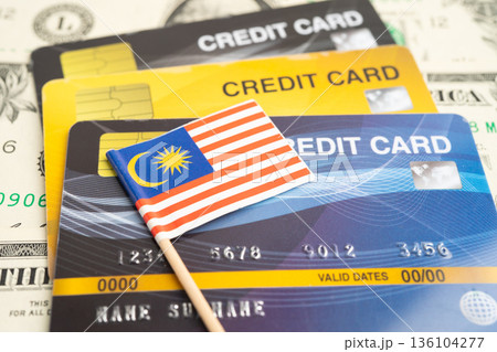 Credit card model with Malaysia flag, financial investment economy business banking. Credit card model with Malaysia flag, financial investment economy business banking. 136104277