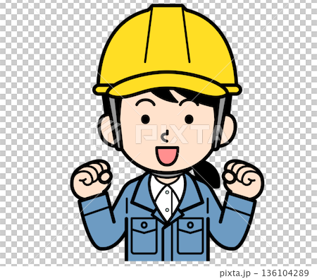 A female site supervisor wearing a helmet pumping her fist 136104289