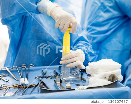 Surgery to remove the breast and replace it with an implant. 136107487