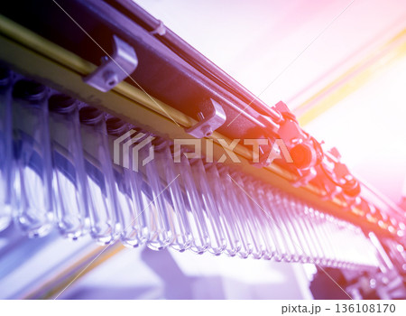 The plastic bottle blowing machine. PET preforms for blowing of plastic bottles 136108170