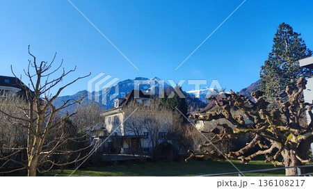 Interlaken,  Switzerland - March 17 2023: Surrounding View of Mountanious Interlaken  136108217