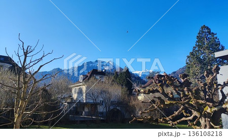Interlaken,  Switzerland - March 17 2023: Surrounding View of Mountanious Interlaken  136108218
