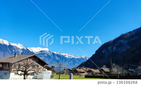 Interlaken, Switzerland - March 17 2023: Surrounding View of Mountanious Interlaken Interlaken, Switzerland - March 17 2023: Surrounding View of Mountanious Interlaken 136108268
