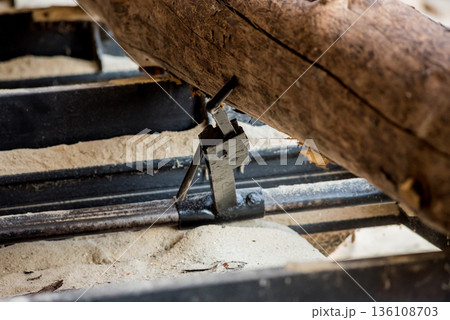 Modern sawmill. Industry sawing boards from logs Modern sawmill. Industry sawing boards from logs 136108703
