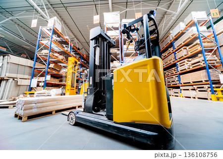 Forklift loader in storage warehouse ship yard. Distribution products. Forklift loader in storage warehouse ship yard. Distribution products. 136108756