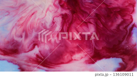 Dye stream blur. Ink spill. Bright red blob explosion on white acrylic paint. Art sparkling particles flow abstract color background. Dye stream blur. Ink spill. Bright red blob explosion on white acrylic paint. Art sparkling particles flow abstract color background. 136109011