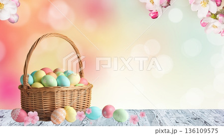 Easter basket full of painted eggs on wood board 136109575