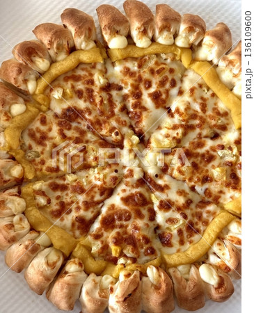 A delicious pizza with a golden crust, melted cheese, and savory toppings. Perfect for food-related designs, menus, or Italian-themed projects, capturing the essence of a classic comfort dish. A delicious pizza with a golden crust, melted cheese, and savory toppings. Perfect for food-related designs, menus, or Italian-themed projects, capturing the essence of a classic comfort dish. 136109600