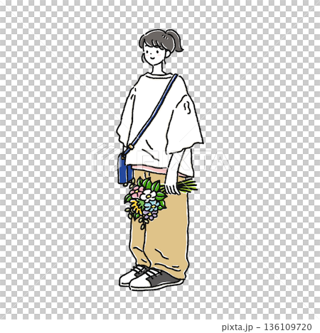 A woman in a natural outfit holding a bouquet 136109720