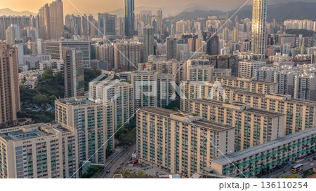 Soft Evening Light Illuminates Dense Skyline Across Mong Kok 136110254