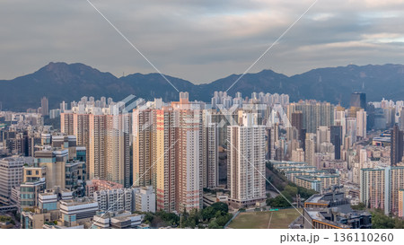 Soft Daylight Illuminates Ho Man Tin Skyline And Mountains 136110260