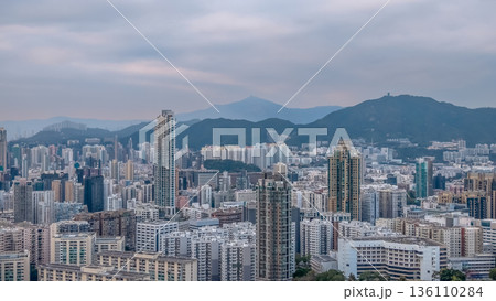Soft Evening Light Illuminates Dense Skyline Across Mong Kok 136110284