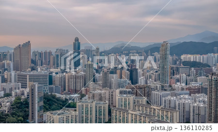 Soft Evening Light Illuminates Dense Skyline Across Mong Kok 136110285