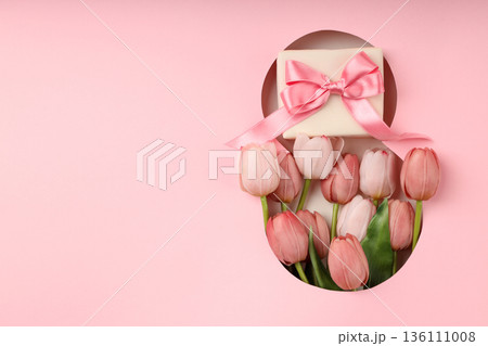 Pink tulips and a gift are perfect for Women's Day celebration Pink tulips and a gift are perfect for Women's Day celebration 136111008