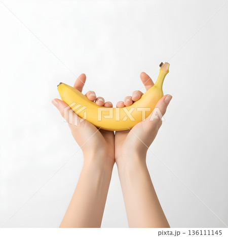 Banana Fruit Banana Held Up High by Two Hands 136111145