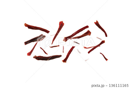 Saffron stamens levitate on a white background 136111165