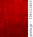 Abstract red textured background with grain noise and uneven surface. Minimal design and visual background concept for design and print. Surface painted with a roller. 136111823