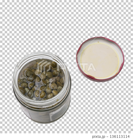 a glass jar with capers in vinegar a glass jar with capers in vinegar 136113114