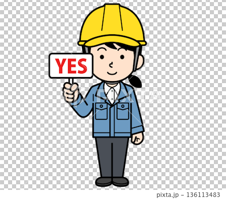 A female site supervisor wearing a helmet holding a YES sign 136113483