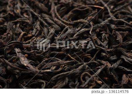 Pile of black tea on white background. 136114576