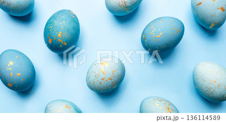 Easter background of eggs painted in blue color. 136114589