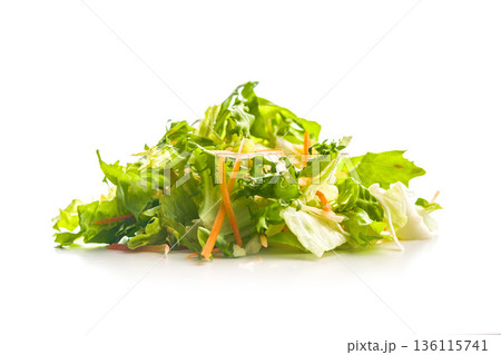 Mix of fresh green salad with carrot isolated on white background. 136115741