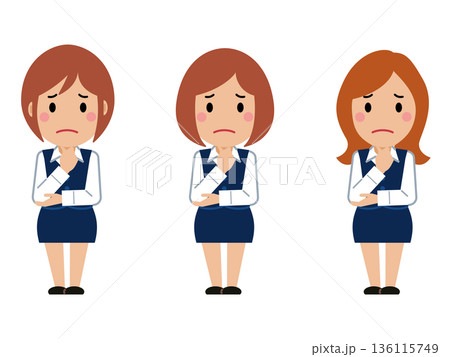 あごに手を当て悩み顔。ネイビー事務服の若い女性 あごに手を当て悩み顔。ネイビー事務服の若い女性 136115749