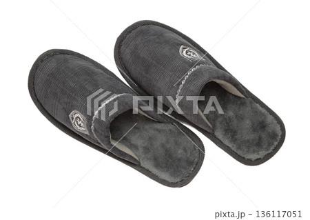 Household grey slippers isolated on white background 136117051