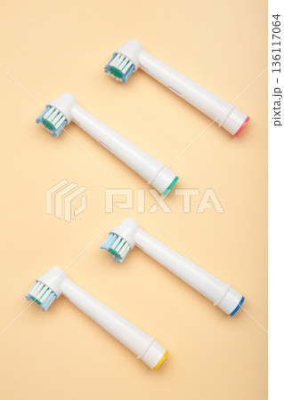 Mykolaiv, Ukraine - January 20, 2026: Oral-B Electric Toothbrush Replacement Brush Heads on beige background 136117064