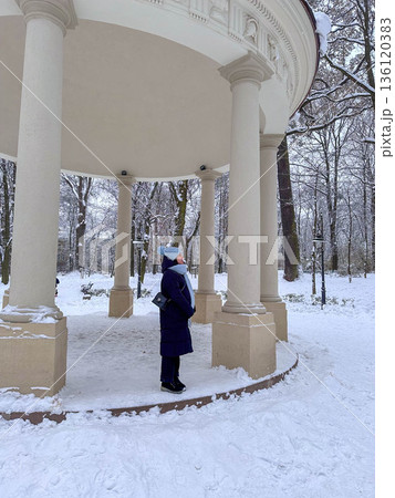 Joyful Pose in Snowy Park Gazebo Joyful Pose in Snowy Park Gazebo 136120383