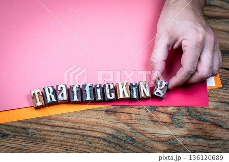 TRAFFICKING Crime And Exploitation Concept Shown With Wooden Letter Blocks 136120689