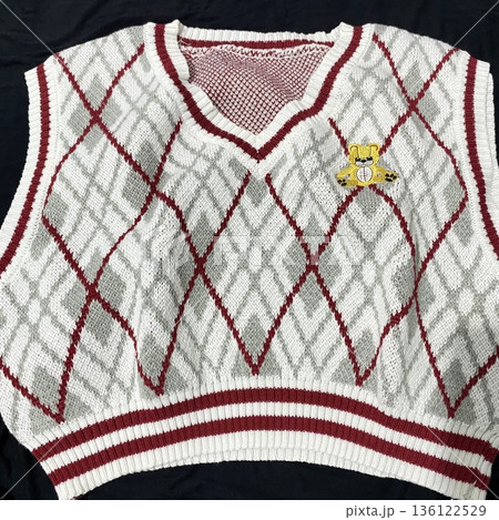 Clothes hanging neatly on hangers under the sun, gently swaying in the breeze—offering a perfect glimpse of fresh laundry days, clean fabric, and simple everyday beauty in every scene. 136122529