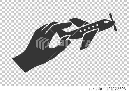 おもちゃの飛行機を持つ手のシルエットアイコン おもちゃの飛行機を持つ手のシルエットアイコン 136122808