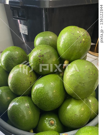 Fresh whole avocado with smooth, dark green skin and rich, creamy texture. Perfect for healthy eating, salads, smoothies, and guacamole. Nutritious, delicious, and full of flavor! Fresh whole avocado with smooth, dark green skin and rich, creamy texture. Perfect for healthy eating, salads, smoothies, and guacamole. Nutritious, delicious, and full of flavor! 136122844