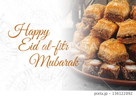 Celebration of Eid al-Fitr with sweets and desserts in a festive setting 136122892