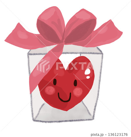 真っ赤なハートが大きなピンクのリボンがかけられた箱の中に入っている 136123176