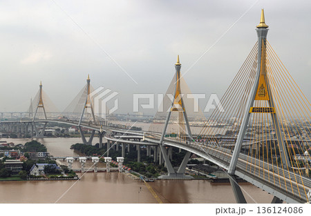 Serving as a vital link between Bangkok and Samut Prakan, the Bhumibol Bridgs, formally the Industrial Ring Road Bridgs. Serving as a vital link between Bangkok and Samut Prakan, the Bhumibol Bridgs, formally the Industrial Ring Road Bridgs. 136124086