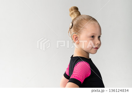 Child head with cochlear implant hearing aid. Copy space. 136124834